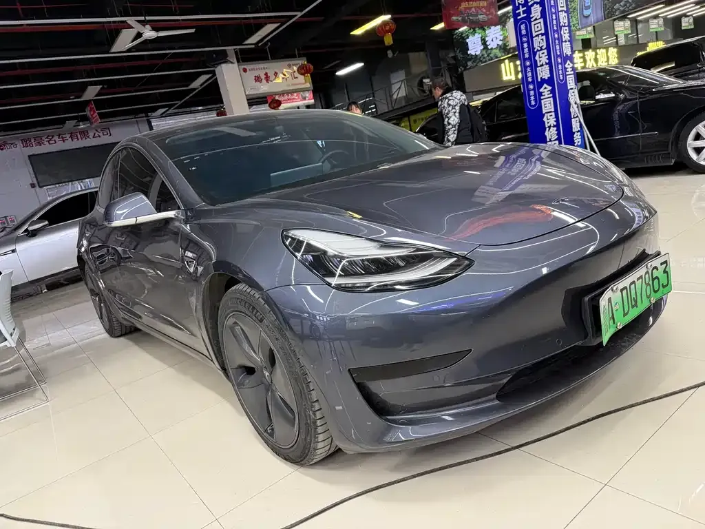 Tesla Model 3 — фото 5