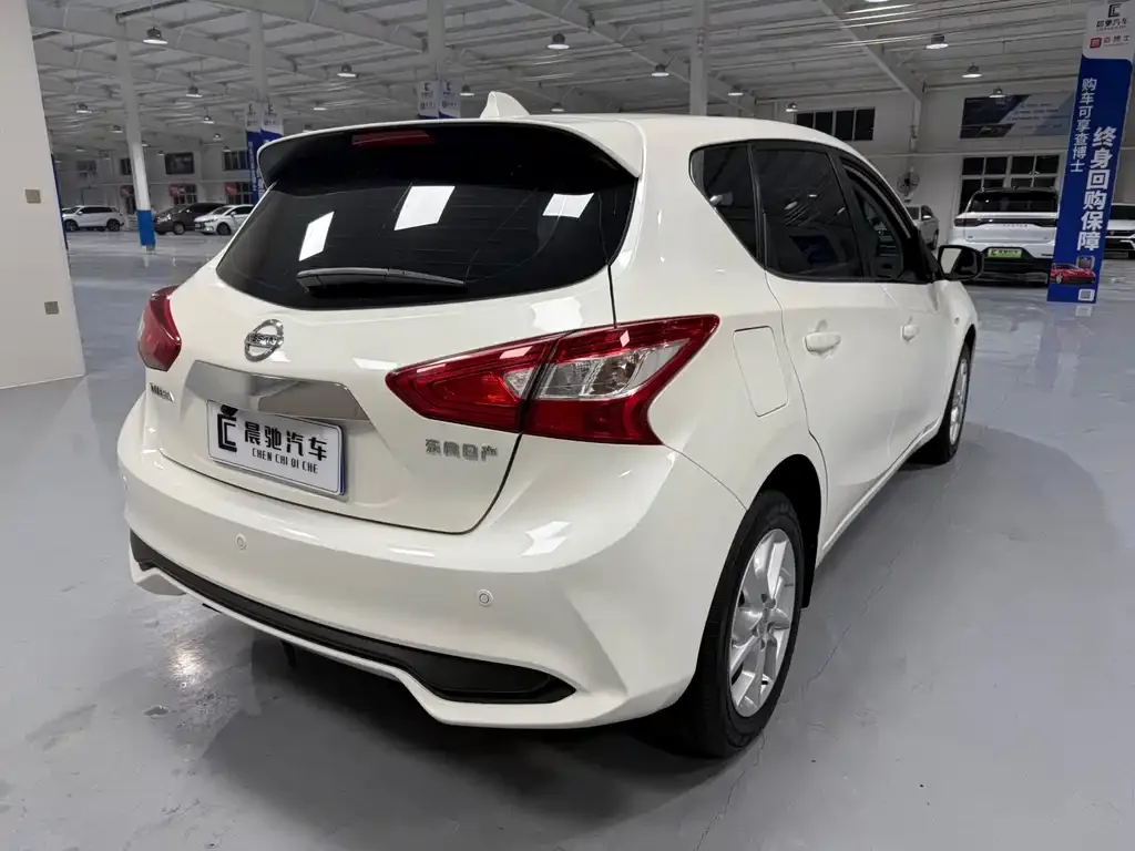 Nissan Tiida — фото 9