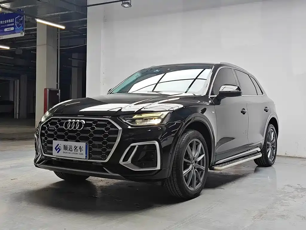 Audi Q5L — фото 5