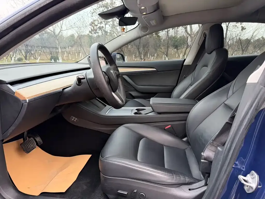 Tesla Model 3 — фото 9