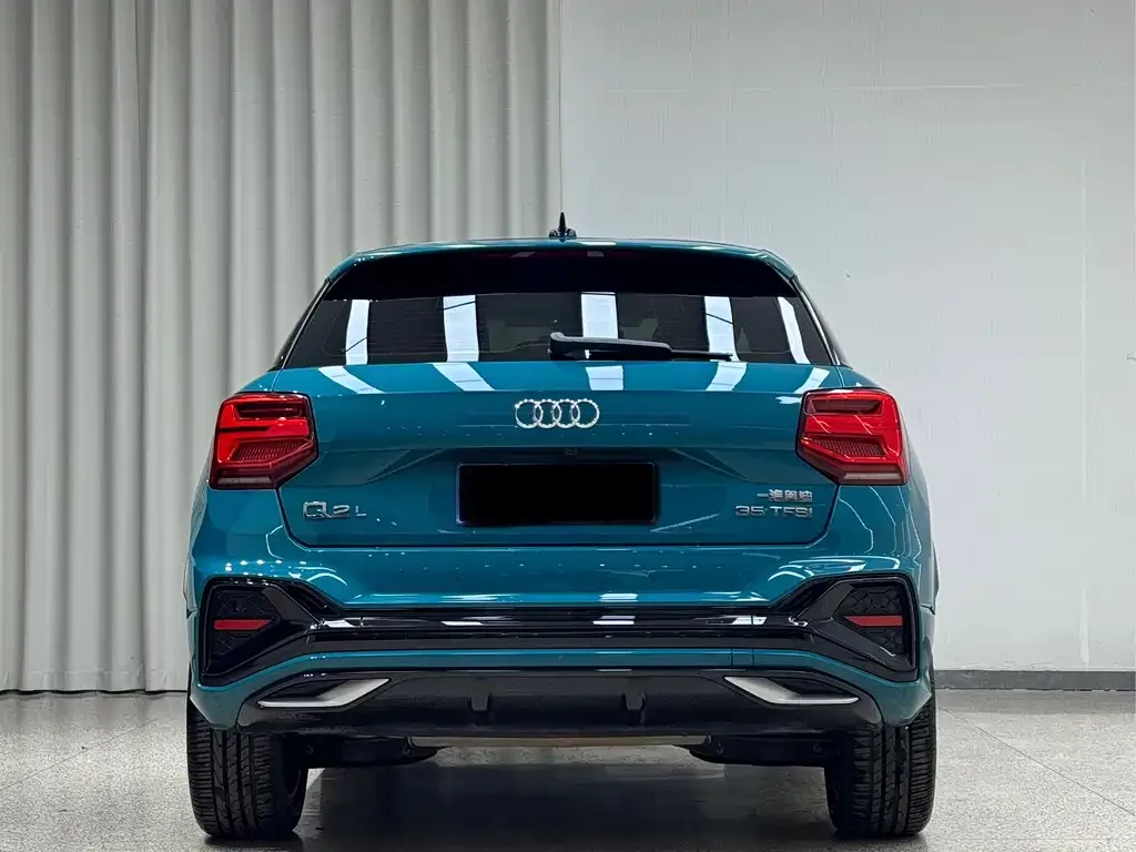 Audi Q2L — фото 4