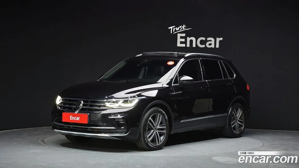 Volkswagen Tiguan — фото 1