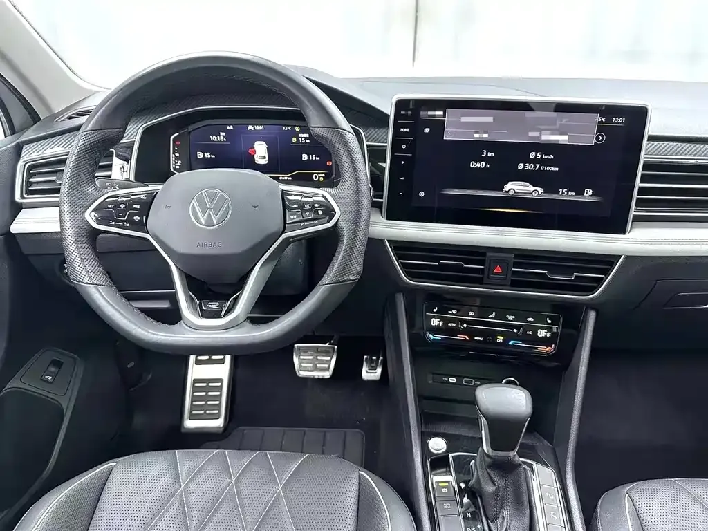 Volkswagen Tiguan L — фото 9