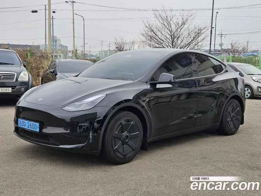 Tesla Model Y — фото 8