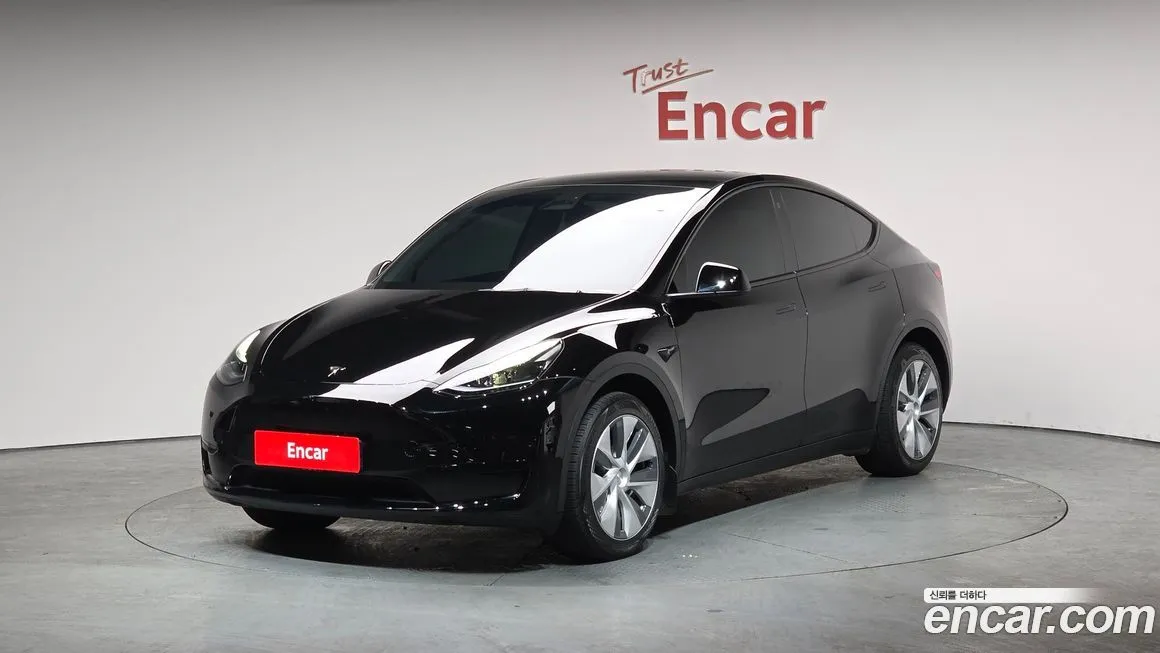 Tesla Model Y — фото 1