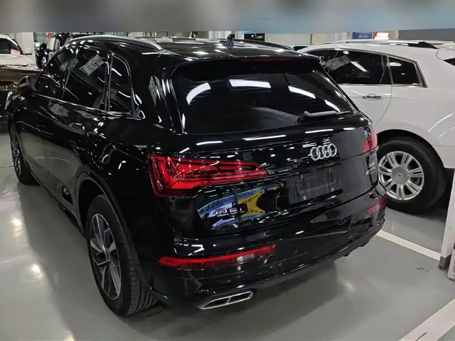 Audi Q5L — фото 8