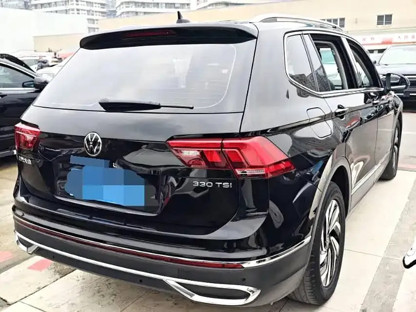 Volkswagen Tiguan L — фото 2