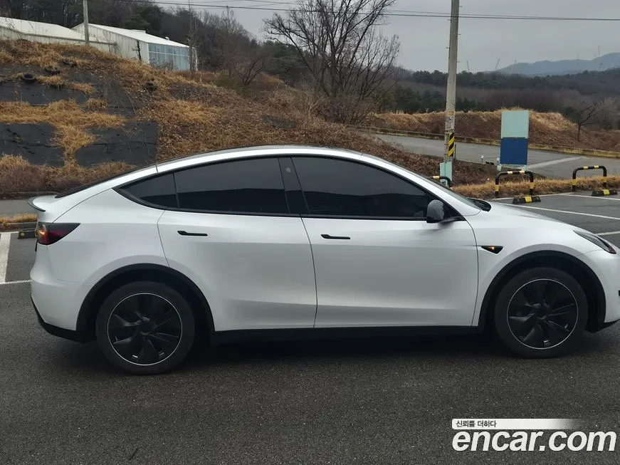 Tesla Model Y — фото 7