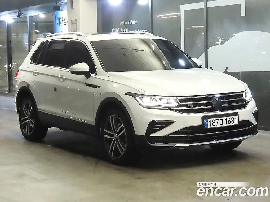 Volkswagen Tiguan — фото 1