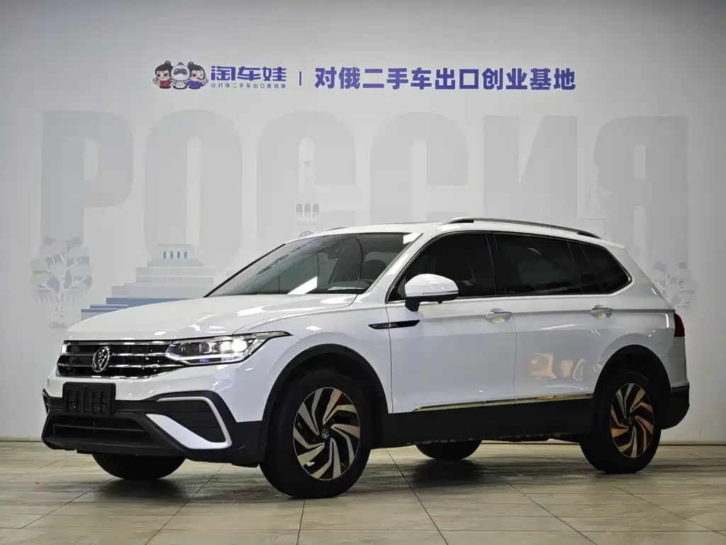 Volkswagen Tiguan L — фото 1