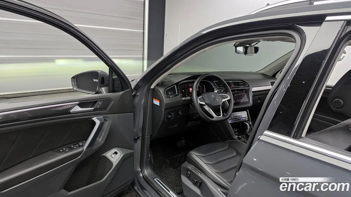 Volkswagen Tiguan — фото 10
