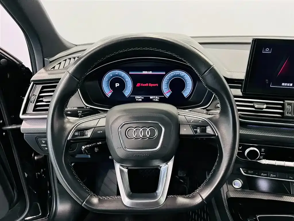 Audi Q5L — фото 9