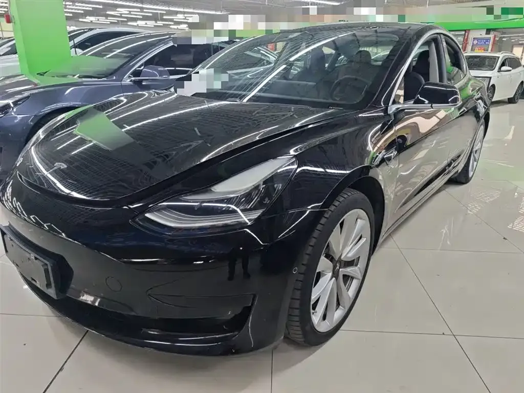 Tesla Model 3 — фото 5