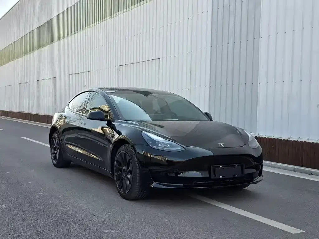 Tesla Model 3 — фото 7