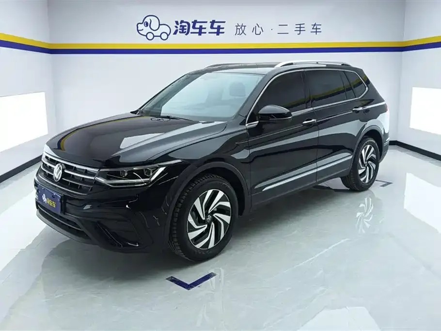 Volkswagen Tiguan L — фото 1