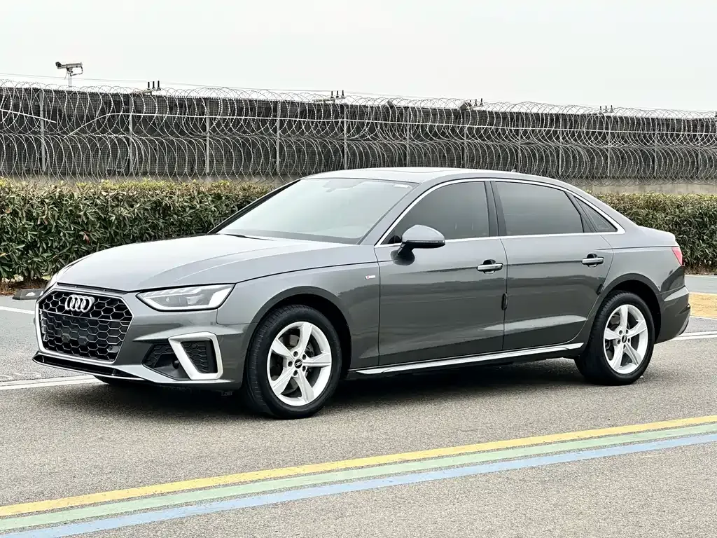 Audi A4L — фото 1