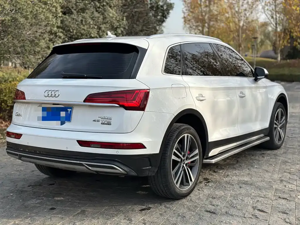 Audi Q5L — фото 8