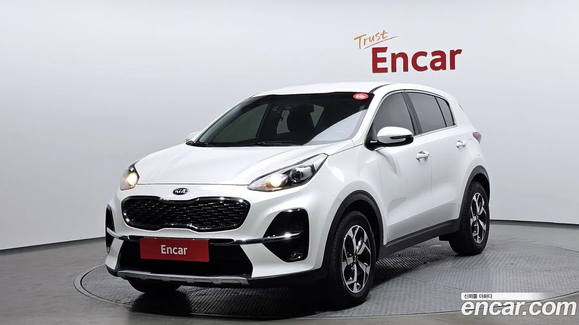 Kia Sportage — фото 1
