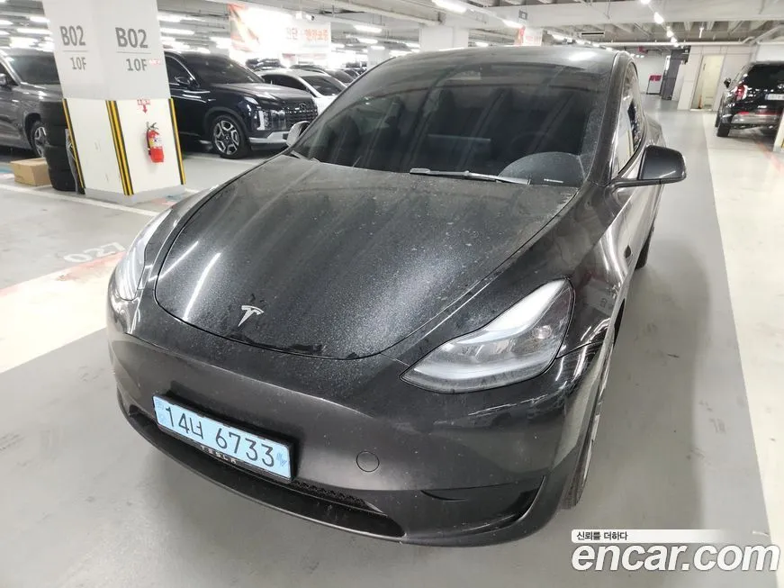 Tesla Model Y — фото 1