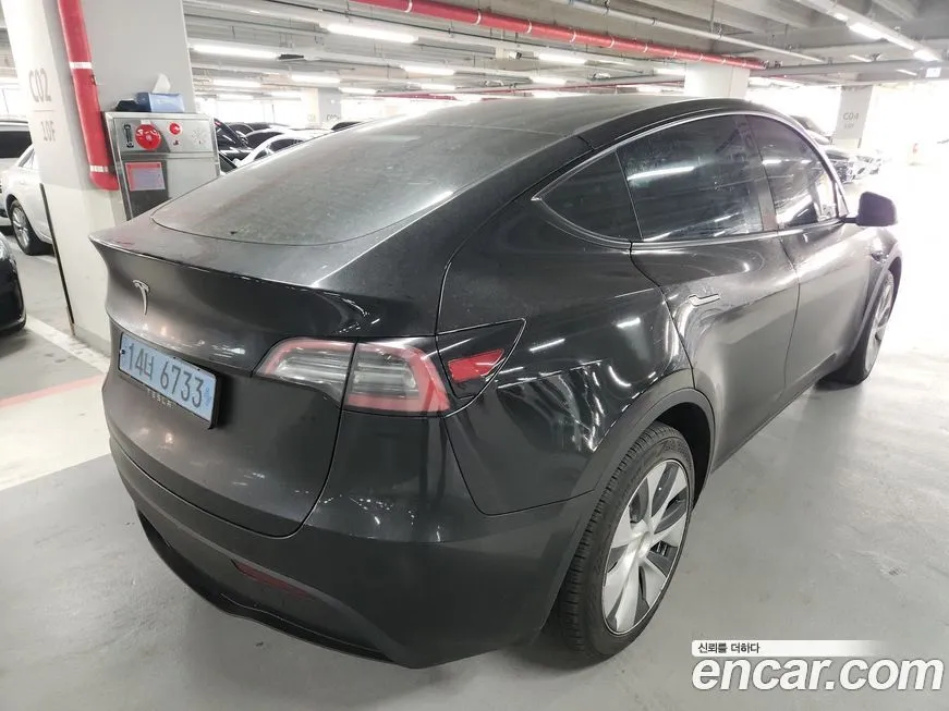 Tesla Model Y — фото 4