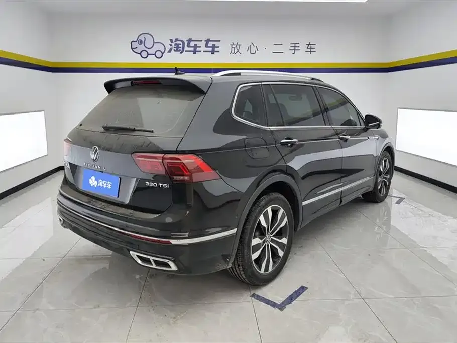 Volkswagen Tiguan L — фото 2
