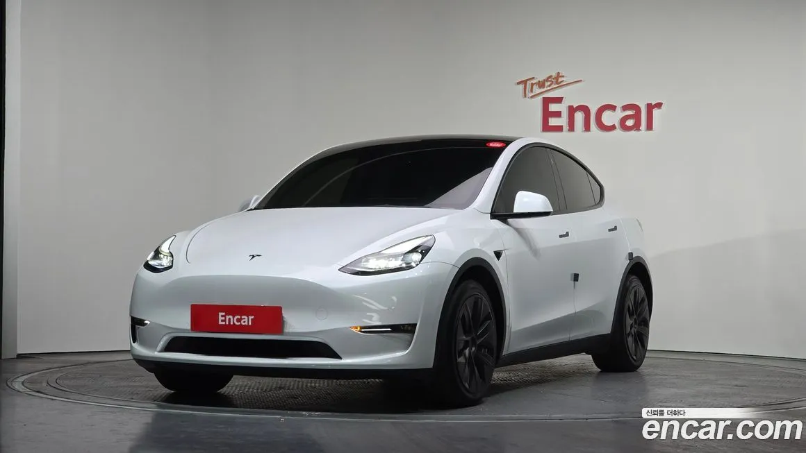 Tesla Model Y — фото 1