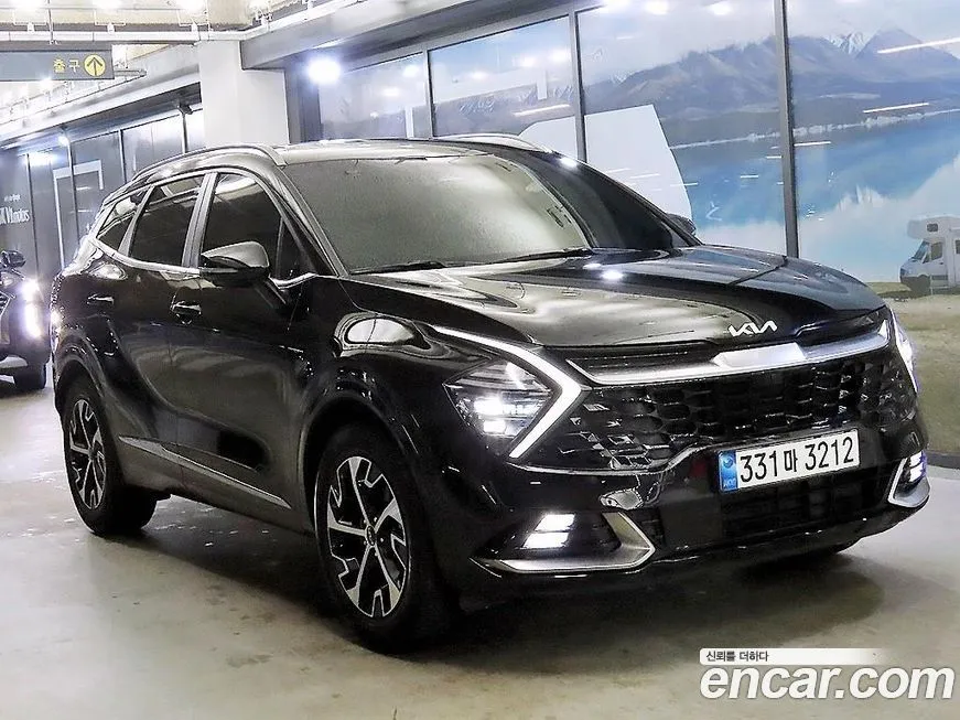 Kia Sportage — фото 1