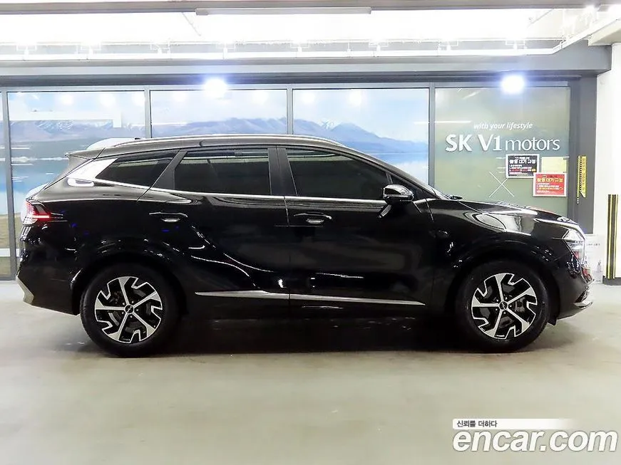 Kia Sportage — фото 10