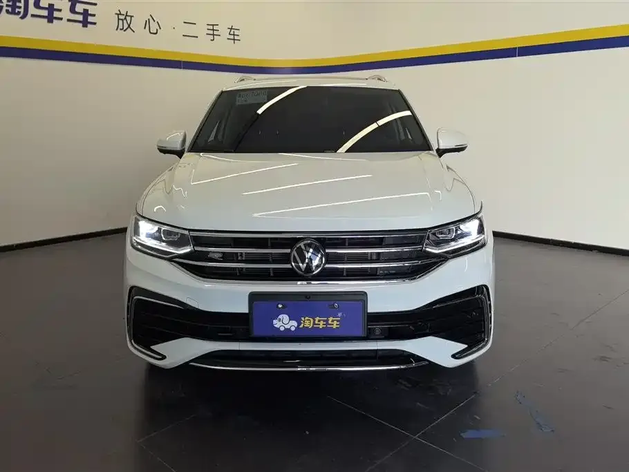 Volkswagen Tiguan L — фото 2