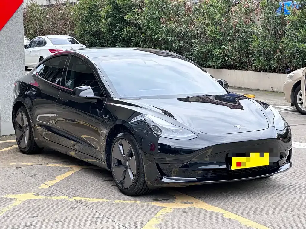 Tesla Model 3 — фото 9