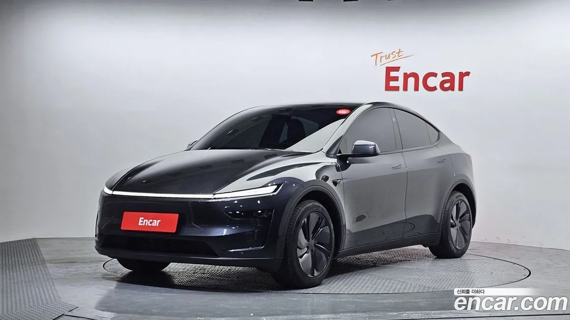 Tesla Model Y — фото 1