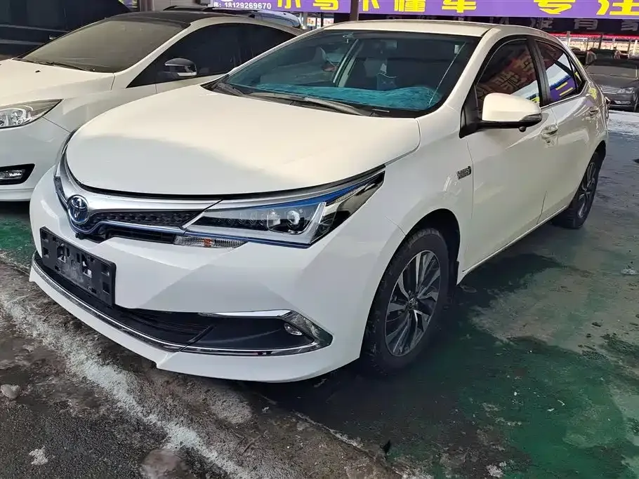 Toyota Corolla Hybrid — фото 1