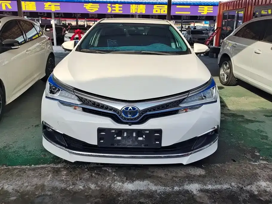 Toyota Corolla Hybrid — фото 10