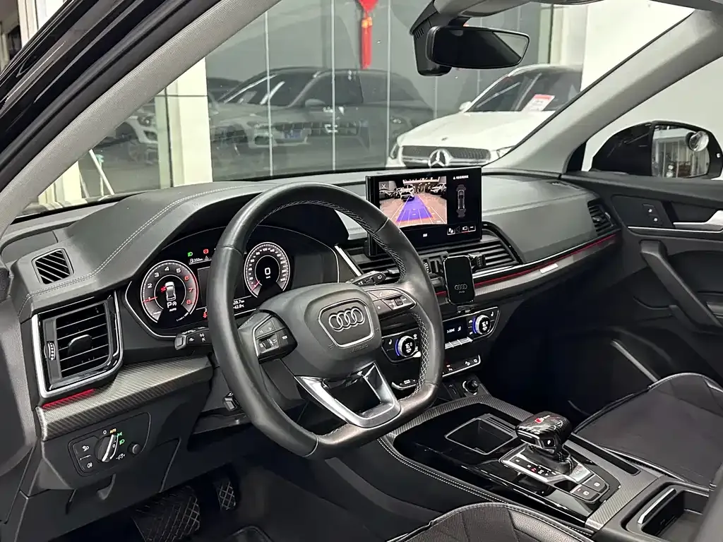 Audi Q5L — фото 7