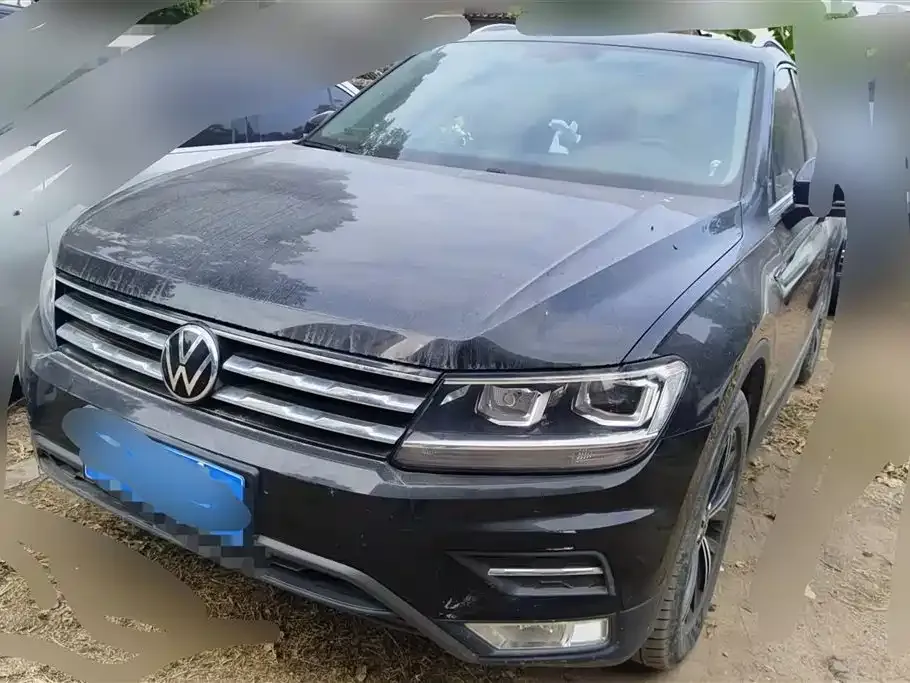 Volkswagen Tiguan L — фото 1