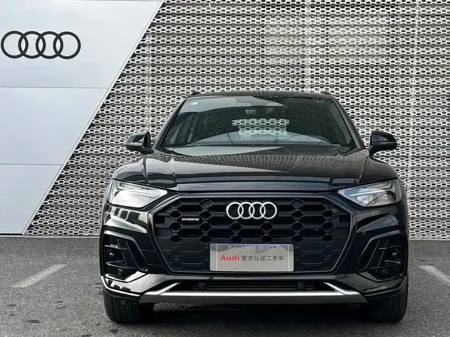 Audi Q5L — фото 6