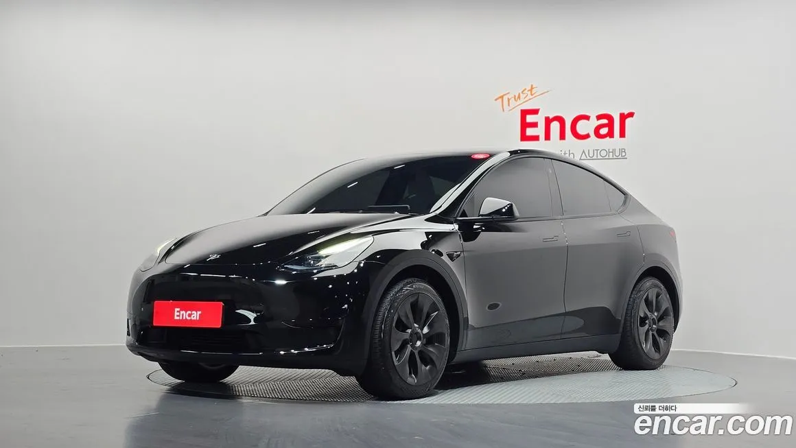 Tesla Model Y — фото 1