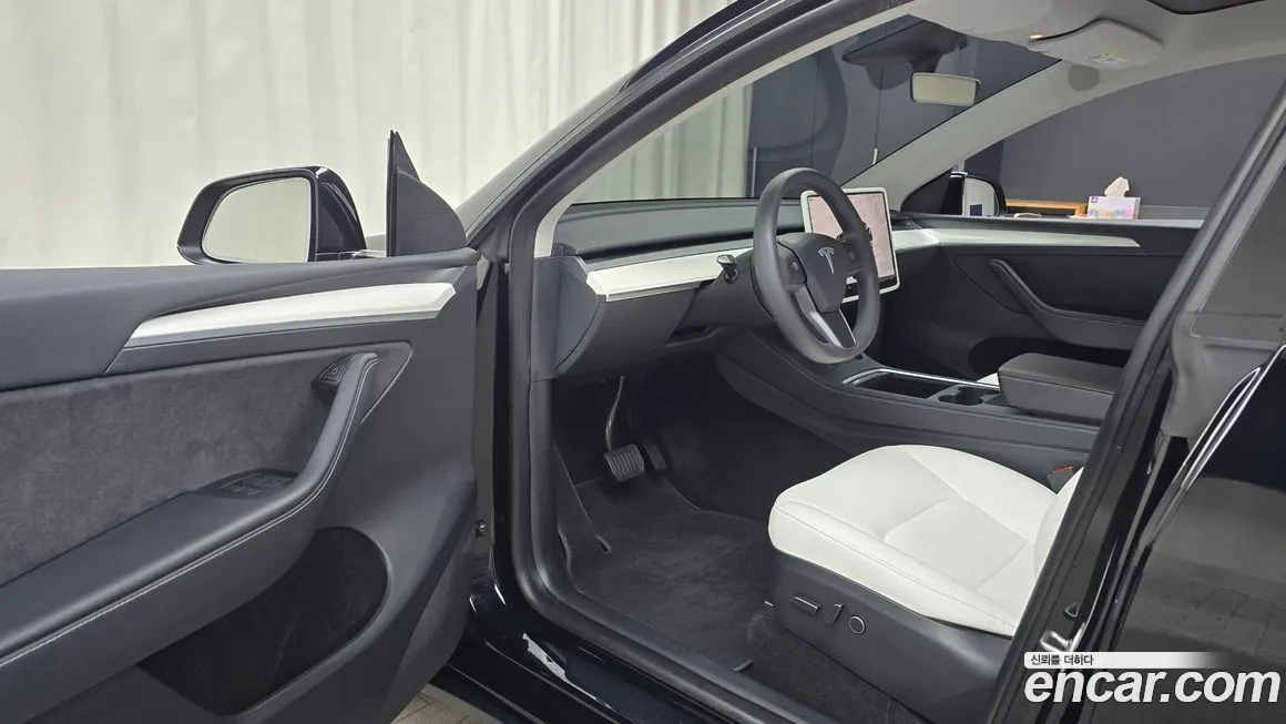 Tesla Model Y — фото 6