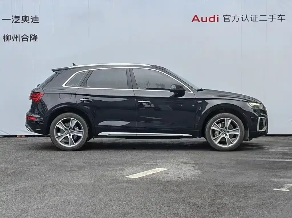 Audi Q5L — фото 10