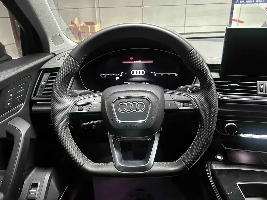 Audi Q5L — фото 5
