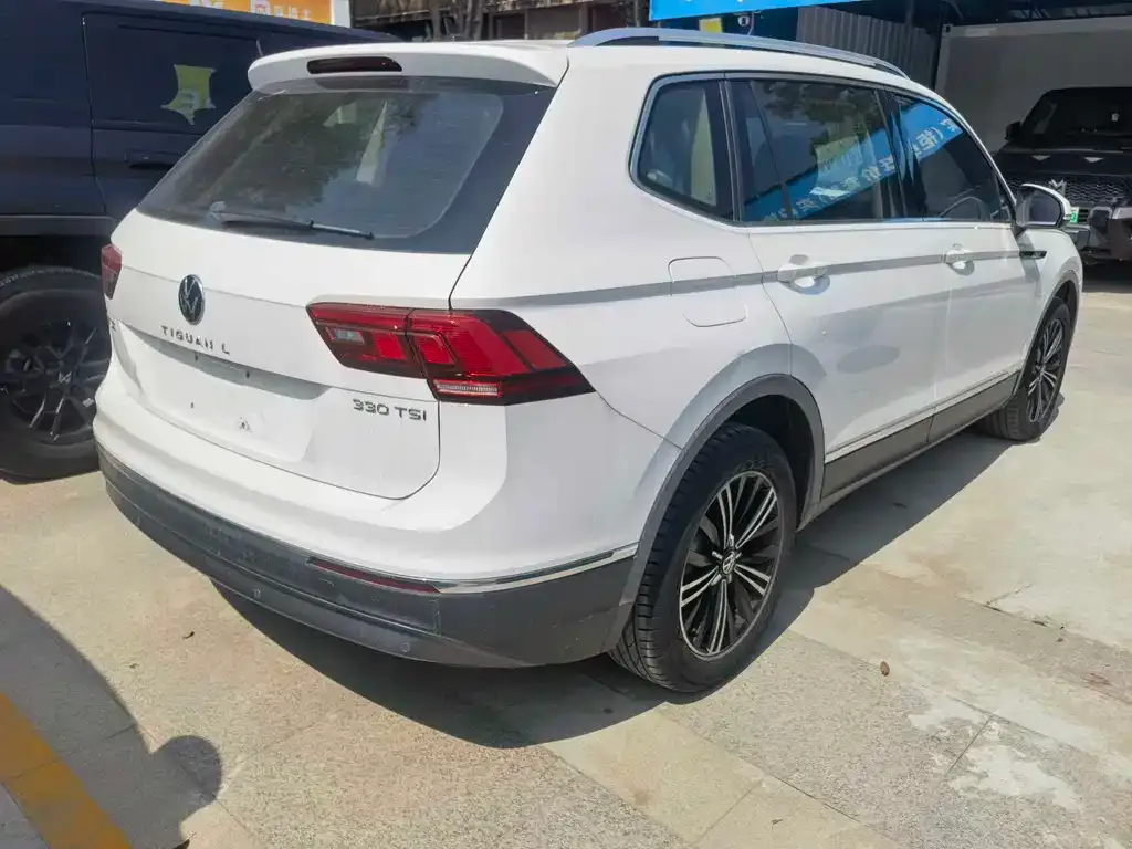 Volkswagen Tiguan L — фото 7