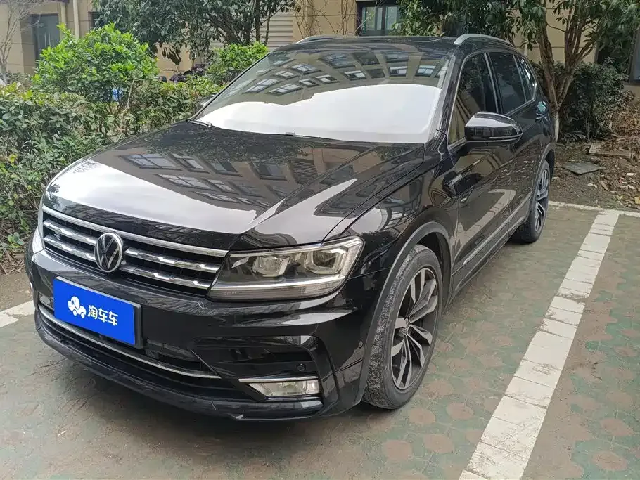 Volkswagen Tiguan L — фото 1