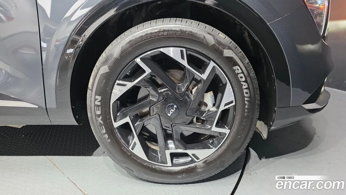 Kia Sportage — фото 10