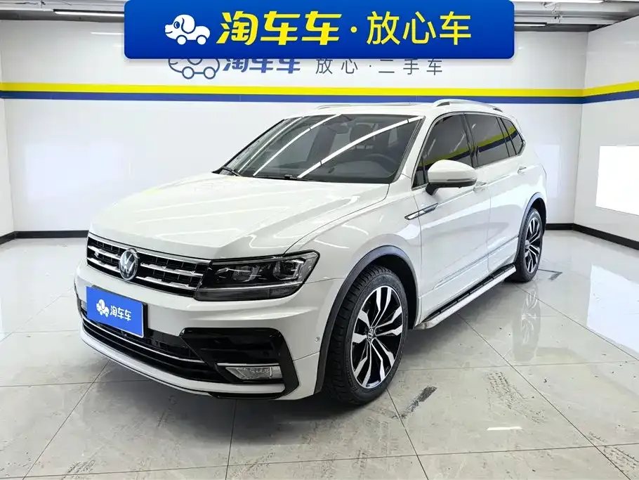 Volkswagen Tiguan L — фото 1