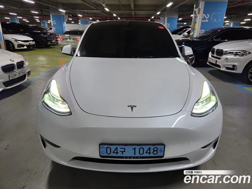 Tesla Model Y — фото 1