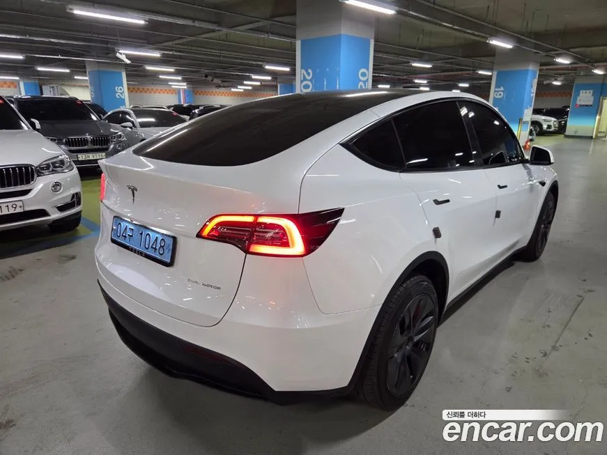 Tesla Model Y — фото 2