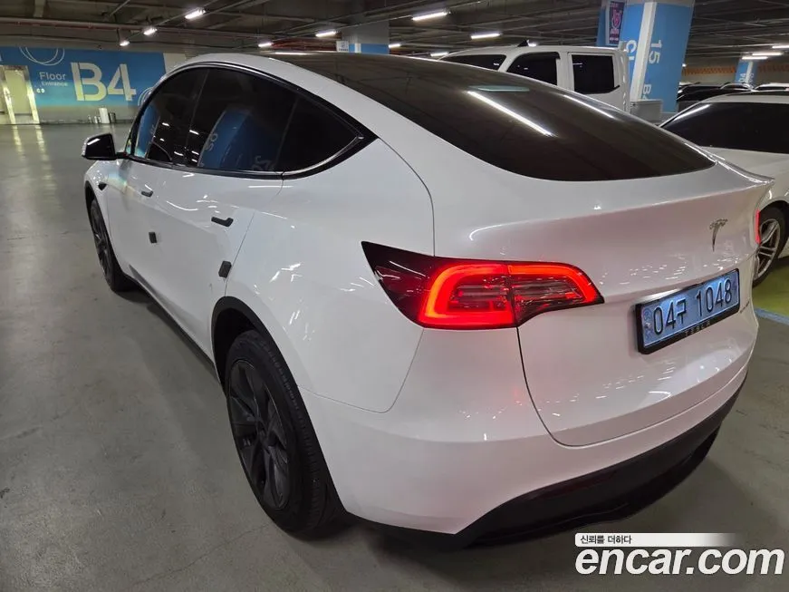 Tesla Model Y — фото 6
