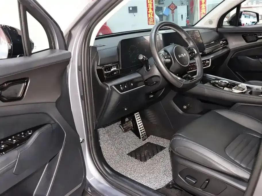 Kia Sportage — фото 10