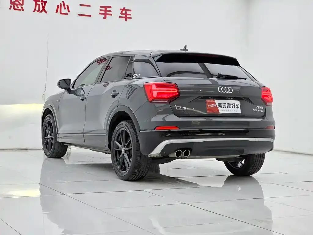 Audi Q2L — фото 10