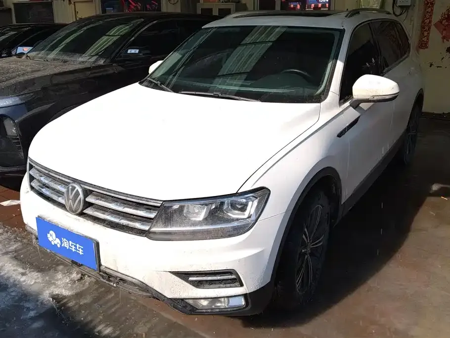 Volkswagen Tiguan L — фото 1